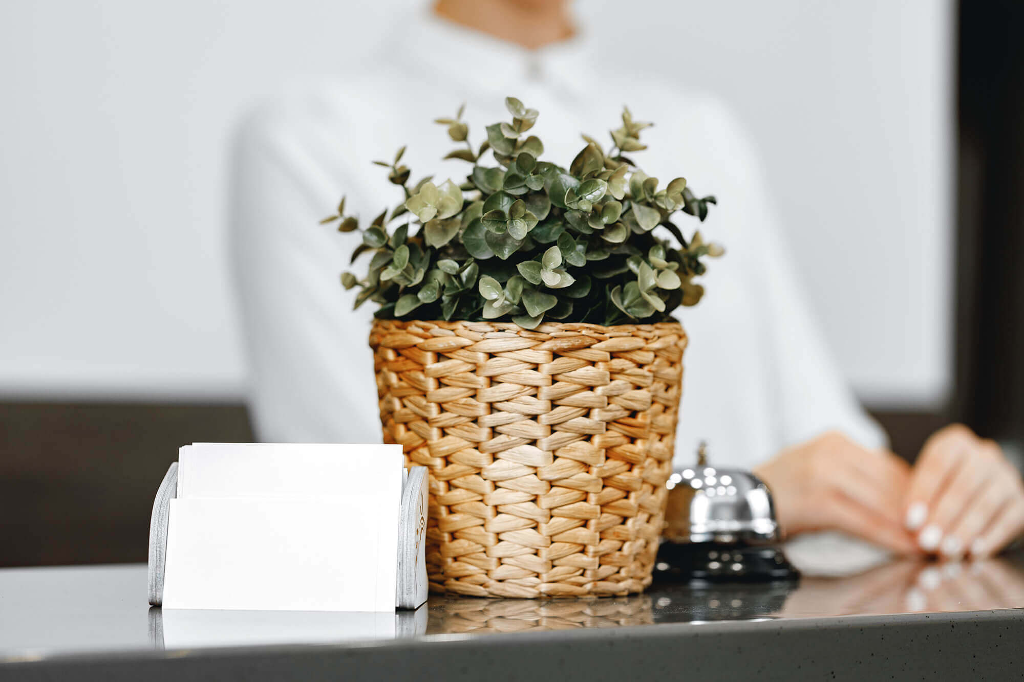 close-up-of-modern-hotel-reception-counter-desk-UCHL9TZ.jpg